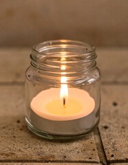 Jar candle with flame
