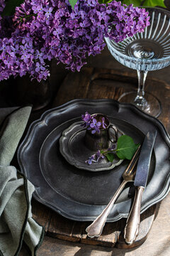 Vintage dining elegance with lilac and antique cutlery