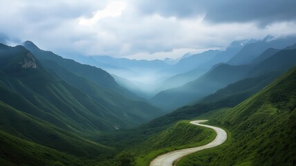 Expansive High Altitude View of Winding Mountain Road and River Valley