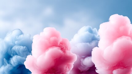 Fototapeta premium Sweet Cotton Candy Clouds - Fluffy pink and blue cotton candy mounds against a light blue sky background. Perfect for food, candy, and fun imagery