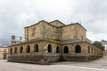 Fototapeta premium Collegiate Church of El Salvador in Grandas de Salime, Spain, showing arcades and stone walls