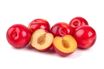 Red plums, fresh and ripe fruit isolated on white background.
