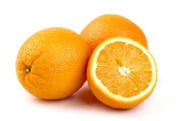 Pile of fresh whole oranges, isolated on white background