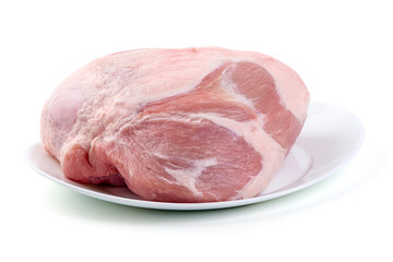 Raw pork ham on white plate, isolated on white background.