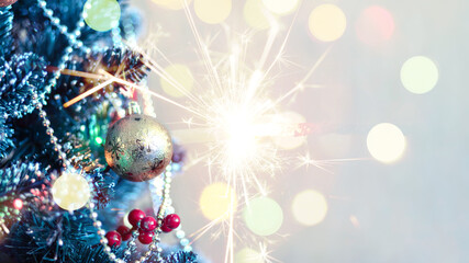 New Year or Christmas background with sparklers. Background of New Year's bokeh, Christmas mood,...