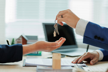 Client pays the agent, who hands over the house keys, marking the official closing and completion...