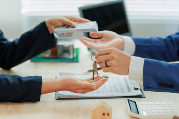 Client pays the agent, who hands over the house keys, marking the official closing and completion...