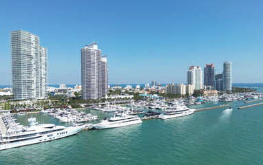 Obraz premium Miami Beach cityscape. Miami summer aerial view. Miami Beach shoreline. South Beach Miami aerial view. Blue ocean in Florida skyline. Miamis cityscape. Ocean coast. Summer skyscraper skyline.