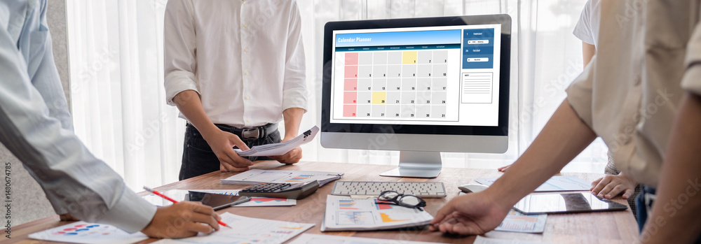 Poster calendar on computer software application for brisk schedule planning for personal organizer and onl
