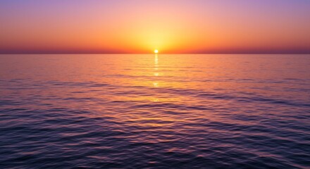 Naklejka premium Vibrant Sunset Over Calm Ocean Waters