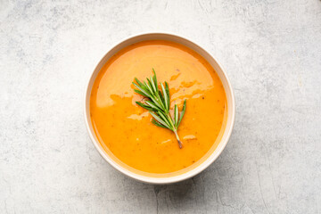 Delicious lentil, ezogelin or pumpkin soup on stone  background