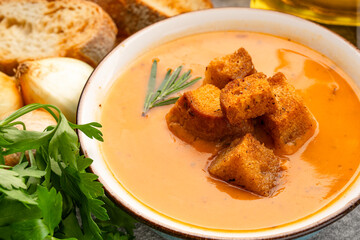 Delicious lentil, ezogelin or pumpkin soup on stone  background