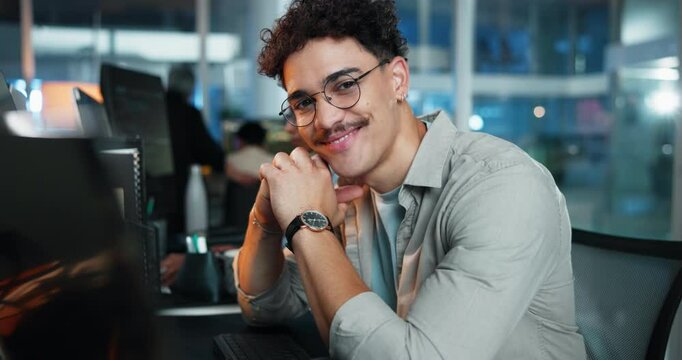 Business, face and smile of programmer man at desk in office as graphic designer for software development. Computer, coding and web design with happy developer or engineer at work for virtual update