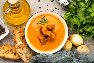 Delicious lentil, ezogelin or pumpkin soup on stone  background