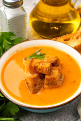 Delicious lentil, ezogelin or pumpkin soup on stone  background