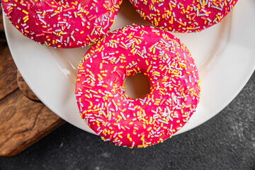 Donut sweet dessert fast food snack sweets fresh delicious gourmet food background on the table...