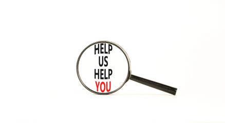 Help you symbol. Concept words phrase Help us help you in beautiful black magnifying glass. Beautiful white background. Business Help you concept. Copy space.