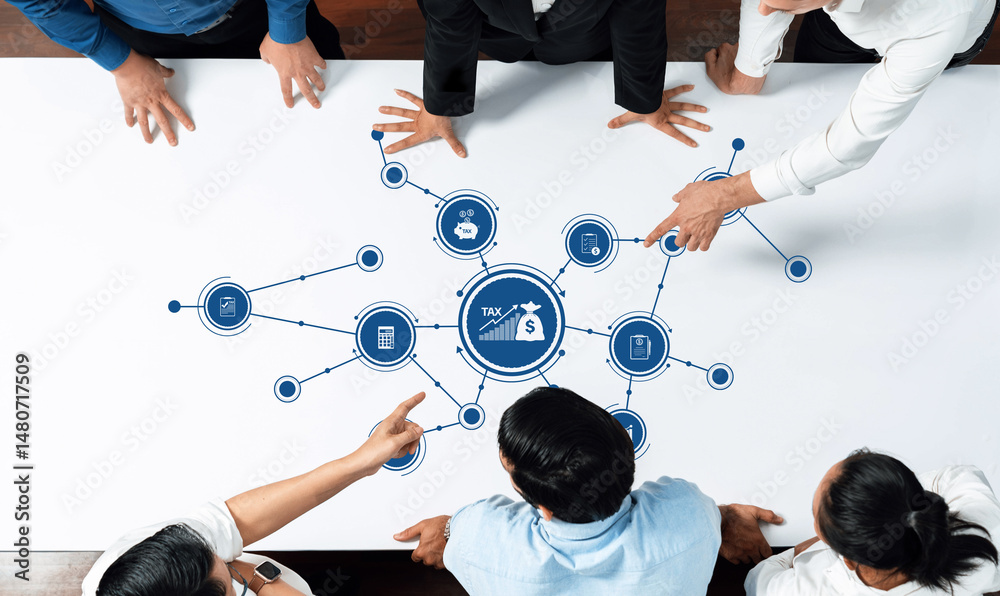 Poster a diverse team collaborates in a strategic meeting focused on financial planning and tax strategies,