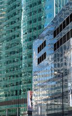 Glass skyscraper on a clear sunny day close-up