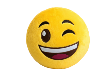 PNG Winking emoji plush pillow with smiling expression and big eyes