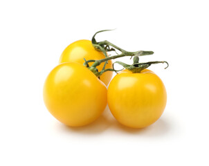 Ripe yellow cherry tomatoes isolated on white