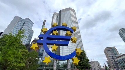 Euro symbol standing tall in frankfurt's financial district - Powered by Adobe