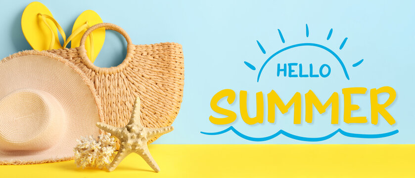 Beach bag with flip-lops, hat, coral and starfish on color background. Hello, summer