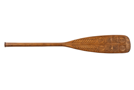 PNG Intricately carved wooden canoe paddle with tribal patterns