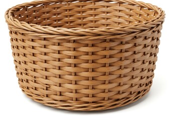 Close up of a round woven wicker basket made of natural material on white background