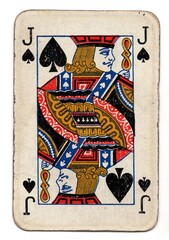 A well used vintage playing card in the suit of spades isolated on a white background.