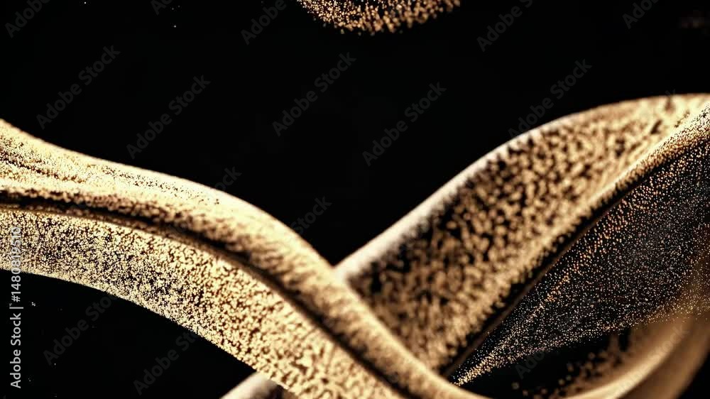Wall mural golden particles are flowing and forming abstract shapes on a black background, creating a visually 