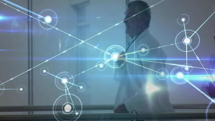 Two doctors adjusting stethoscopes in medical corridor, showing digital network graphics overlay - Powered by Adobe