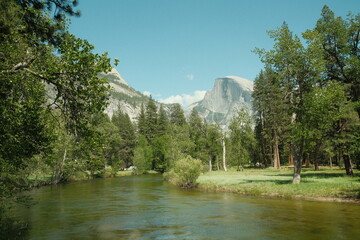 Yosemite National Park in California&rsquo;s Sierra Nevada mountains green foliage on sunny day beautiful landscape