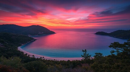 Vibrant sunrise over a tranquil bay