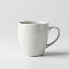 Obraz premium Simple White Ceramic Mug - A clean, simple white ceramic mug, perfect for coffee, tea, or hot chocolate. A versatile for various uses