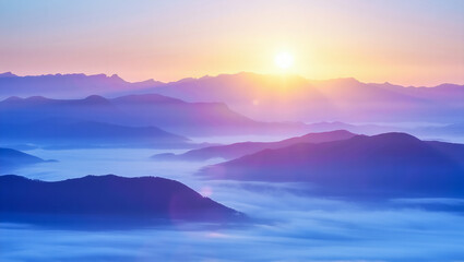 Beautiful sunrise over mountain range with atmospheric perspective and vibrant colours