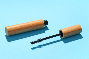 Black mascara on blue background