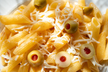 Pasta With Olives, Herbs And Cheese. Healthy Food. Italian Cuisine close up