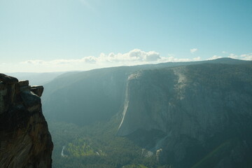 Yosemite National Park in California’s Sierra Nevada mountains aesthetic greenery landscape scenery on sunny day granite cliffs waterfall