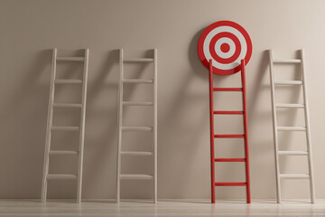 Three ladders against beige wall, one red leaning against a target, symbolizing ambition and goal achievement.  Free space for text