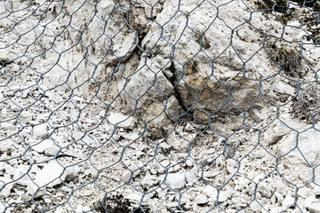 a metal net protecting from falling rocks