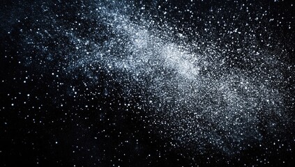 Obraz premium A mesmerizing view of a cosmic dust cloud scattered across a dark background. evoking the vastness of space. perfect for use in science and astronomy-related projects