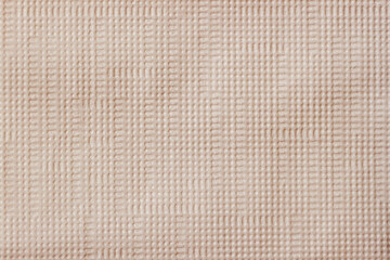 Beige art paper canvas texture, geometric embossed pattern and soft woven grid across surface. Concept of fabric, texture and minimal background