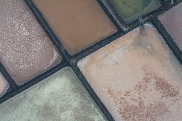 SALINAS DE JANUBIO salt flats on Lanzarote island, historic salt production site along volcanic coastline of Canary Islands	
