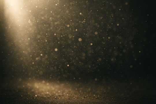 Airborne dust particles float in a beam of warm light in a dark space, creating a magical, dreamy atmosphere with glowing bokeh.