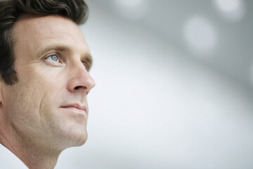 portrait of neuromarketing specialist in bright office positioned on left side of frame