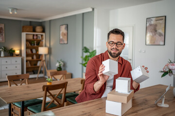Small business owner preparing packages for shipping at home