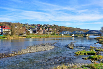 Kroscienko on the Dunajec village, Pieniny, Poland.
Three span bridge on the river.