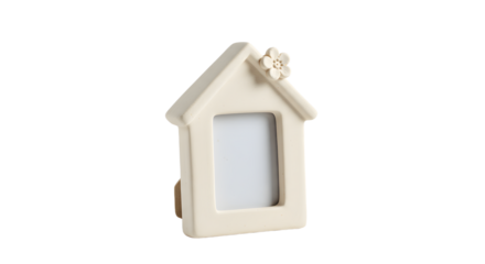 A charming decorative photo frame shaped like a house, set against a clean background, perfect for home decor