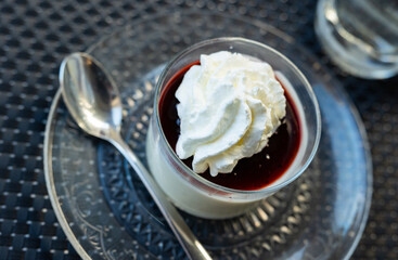 Sweet whipped wild berry mousse served in bowl for dessert